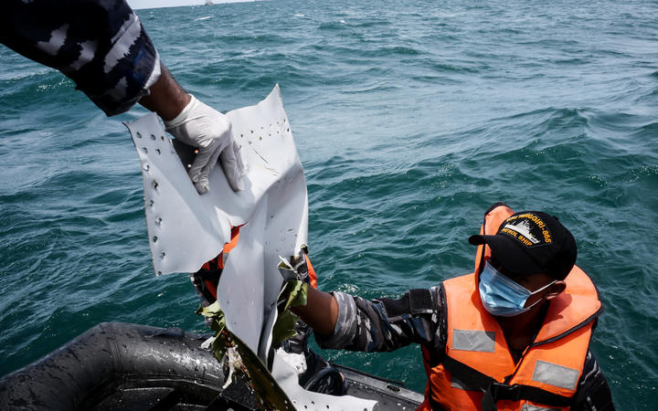 Indonesian divers recover black box from crashed Sriwijaya Air plane